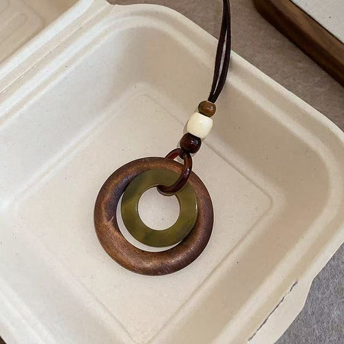 Soumra Earthen Cycle Layered Pendant