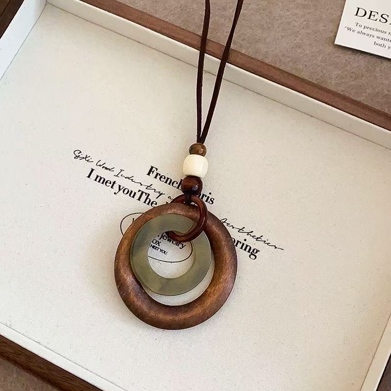 Soumra Earthen Cycle Layered Pendant